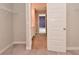 Bedroom features carpeted floors, large closet and ensuite bathroom at 10319 Pronghorn Ln, Indianapolis, IN 46239