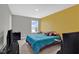 This bedroom has carpet and a window with blinds at 10319 Pronghorn Ln, Indianapolis, IN 46239