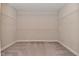 Walk-in closet boasts ample storage with built-in shelving at 10319 Pronghorn Ln, Indianapolis, IN 46239