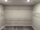 Spacious walk-in closet with wire shelving and ample storage space at 10319 Pronghorn Ln, Indianapolis, IN 46239