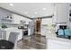 Spacious kitchen featuring stainless steel appliances, white cabinets, and granite countertops at 10955 Balfour Dr, Noblesville, IN 46060