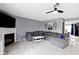 Spacious living room featuring comfortable seating, a fireplace, and a bright, airy feel at 10955 Balfour Dr, Noblesville, IN 46060