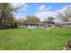 Expansive backyard with lush green grass, offering ample space for outdoor activities and relaxation at 1255 Easy St, Greenwood, IN 46142