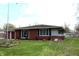 Single story brick home with well maintained yard and landscape at 1255 Easy St, Greenwood, IN 46142