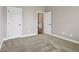 Bedroom with neutral carpet, light-colored walls, and white trim at 13494 Moorcroft Dr, Fishers, IN 46037