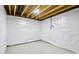 Unfinished basement featuring sealed walls and visible ceiling beams at 13494 Moorcroft Dr, Fishers, IN 46037