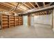 Unfinished basement provides ample storage and has wooden ceiling beams at 13494 Moorcroft Dr, Fishers, IN 46037