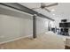 Spacious basement area featuring neutral carpet, grey accents, and recessed lighting at 1575 Oakvista Dr, Greenwood, IN 46143