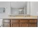 Bathroom featuring double sinks, ample counter space, and neutral decor at 1575 Oakvista Dr, Greenwood, IN 46143