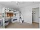 Lofted bed featuring lighting, shelving, carpet, and neutral colors at 1575 Oakvista Dr, Greenwood, IN 46143