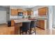 Well-equipped kitchen with modern appliances, ample counter space, and a kitchen island at 1575 Oakvista Dr, Greenwood, IN 46143