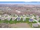Wide aerial view of a neighborhood featuring well-maintained homes, streets and yards at 16193 Burnt Rock Ln, Fortville, IN 46040