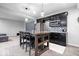 Modern basement bar with sleek cabinetry, stainless steel appliances, and seating at 16193 Burnt Rock Ln, Fortville, IN 46040