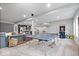 Finished basement with ping pong table, small bar area, and oversized sectional at 16193 Burnt Rock Ln, Fortville, IN 46040