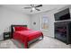 Cozy bedroom with a comfortable bed, dark furniture, and natural light at 16193 Burnt Rock Ln, Fortville, IN 46040