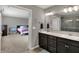 Bathroom with double vanity and updated lighting and fixtures at 1691 Beyers St, Fortville, IN 46040