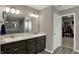 Bathroom with double sinks and walk-in closet at 1691 Beyers St, Fortville, IN 46040