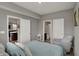 Comfortable bedroom featuring a view of the bathroom and closet at 1691 Beyers St, Fortville, IN 46040