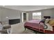Bedroom with neutral walls and carpet, and ensuite bath at 1691 Beyers St, Fortville, IN 46040