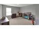 Spacious bedroom with carpeted floor and neutral gray paint at 1691 Beyers St, Fortville, IN 46040