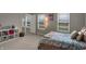 Inviting bedroom with natural light from windows and organized storage at 1691 Beyers St, Fortville, IN 46040