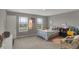 Bedroom has carpet floors, windows for natural light, and stylish décor at 1691 Beyers St, Fortville, IN 46040