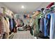 Walk-in closet features rods, shelves, and ample space for organizing clothes and shoes at 1691 Beyers St, Fortville, IN 46040
