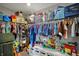 Walk-in closet featuring lots of shelving for shoes and clothes and overhead storage at 1691 Beyers St, Fortville, IN 46040