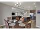 Bright dining room with an open floor plan, adjacent to kitchen and living room, great for entertaining at 1691 Beyers St, Fortville, IN 46040