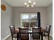Bright dining room featuring a sliding glass door with backyard view at 1691 Beyers St, Fortville, IN 46040