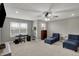 Open loft area is illuminated by many windows and recessed lights at 1691 Beyers St, Fortville, IN 46040