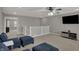 Open loft area features comfortable seating and stairway access at 1691 Beyers St, Fortville, IN 46040