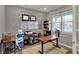 Functional home office with ample desk space, a whiteboard, and natural light at 1691 Beyers St, Fortville, IN 46040
