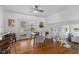 Bright dining room with hardwood floors and French doors leading to the backyard at 1708 Fox Hill Dr, Indianapolis, IN 46228
