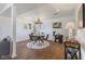 Cozy dining area with a round table, unique lighting, and stylish decor at 1708 Fox Hill Dr, Indianapolis, IN 46228