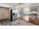 Updated kitchen featuring stainless steel appliances, butcher block countertops, and modern cabinetry at 2221 Groff Ave, Indianapolis, IN 46222