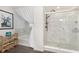 Bright bathroom featuring a glass shower and tub at 2538 Redding Dr, Whitestown, IN 46075