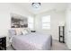 Comfortable bedroom with neutral tones, a queen-sized bed, and ample natural light at 2538 Redding Dr, Whitestown, IN 46075