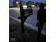 Illuminated mailbox displays street address in front of neighborhood homes at 2538 Redding Dr, Whitestown, IN 46075