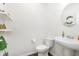 Cozy powder room featuring a pedestal sink and decorative accents at 2538 Redding Dr, Whitestown, IN 46075