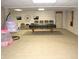 Spacious basement with a pool table and seating, featuring brick accent walls at 2692 E County Road 750 S, Clayton, IN 46118