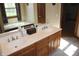 Bathroom with double sinks and a soaking tub reflected in the large mirror at 2692 E County Road 750 S, Clayton, IN 46118
