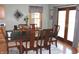 Formal dining room with hardwood floors, a window, and direct access to the patio at 2692 E County Road 750 S, Clayton, IN 46118