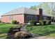 Charming home with a well-manicured lawn and a quaint walkway leading to the side of the house at 2692 E County Road 750 S, Clayton, IN 46118