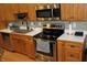 Kitchen featuring stainless steel appliances, modern countertops, and a contemporary design at 2692 E County Road 750 S, Clayton, IN 46118