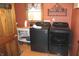 Modern laundry room equipped with new washer and dryer, plus ample storage and natural light at 2692 E County Road 750 S, Clayton, IN 46118