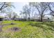 Spacious backyard with trees and grassy areas at 2741 Mars Hill St, Indianapolis, IN 46241