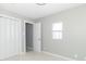 Bedroom with neutral carpet, paint, closet, and doorway at 2741 Mars Hill St, Indianapolis, IN 46241