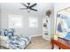 Cozy bedroom featuring a comfortable seating area and ample natural light at 2741 Mars Hill St, Indianapolis, IN 46241