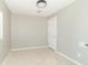 Bedroom with neutral carpet and paint with closet and window at 2741 Mars Hill St, Indianapolis, IN 46241